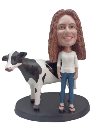 Woman Next to a Cow