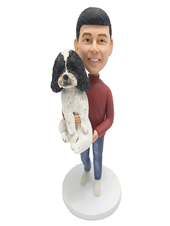 Boy Carrying a Dog